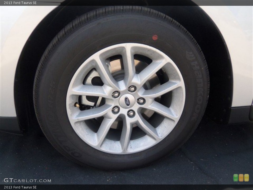 2013 Ford Taurus SE Wheel and Tire Photo #67488058