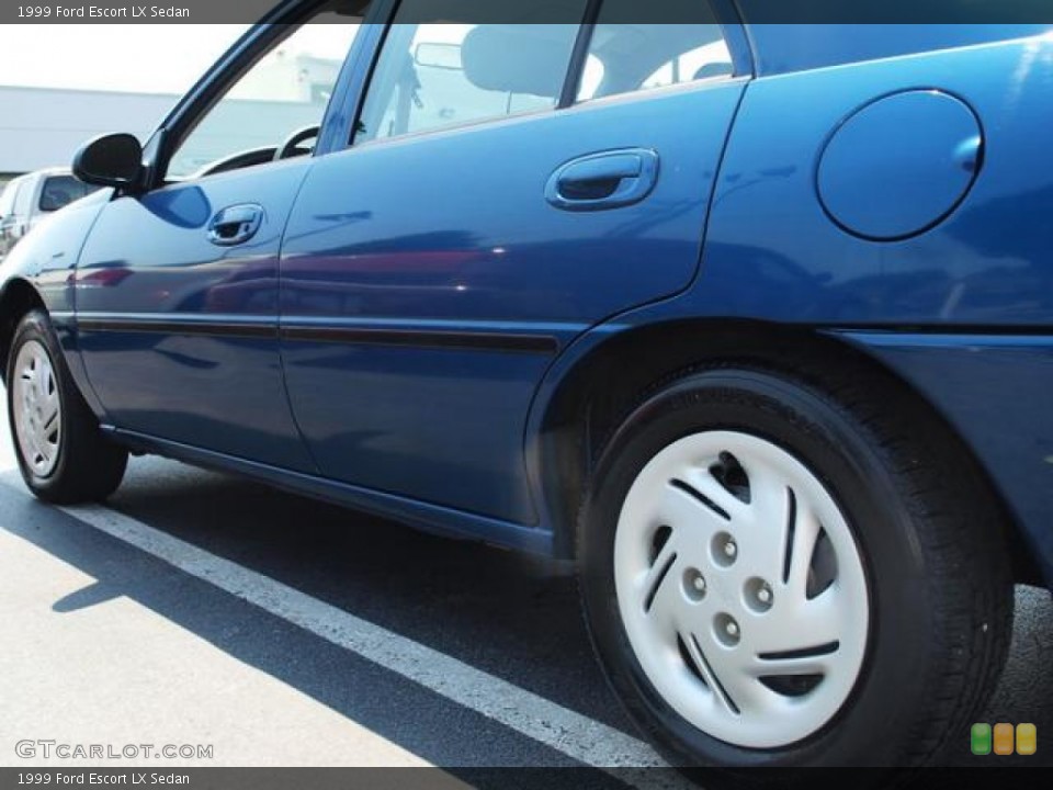 1999 Ford Escort LX Sedan Wheel and Tire Photo #67664863