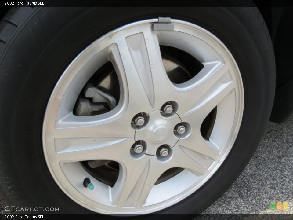 2002 Ford Taurus SEL Wheel and Tire Photo #68214483