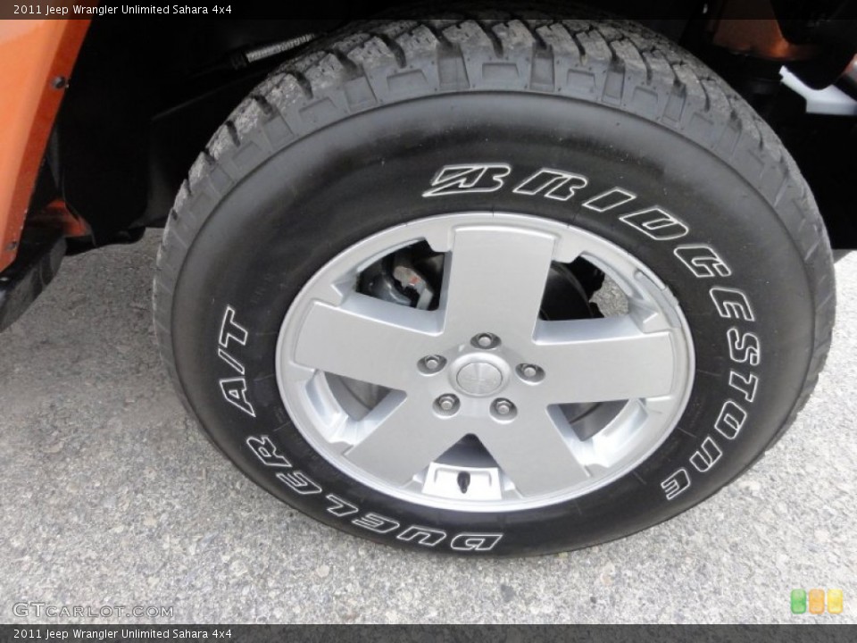 2011 Jeep Wrangler Unlimited Sahara 4x4 Wheel and Tire Photo #68269412