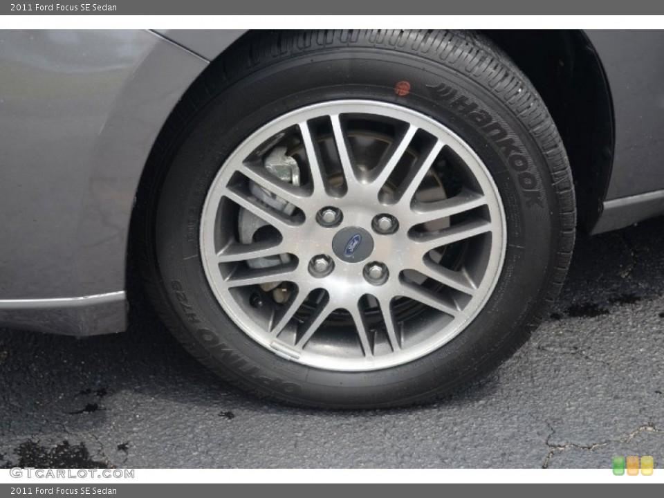 2011 Ford Focus SE Sedan Wheel and Tire Photo #68518657