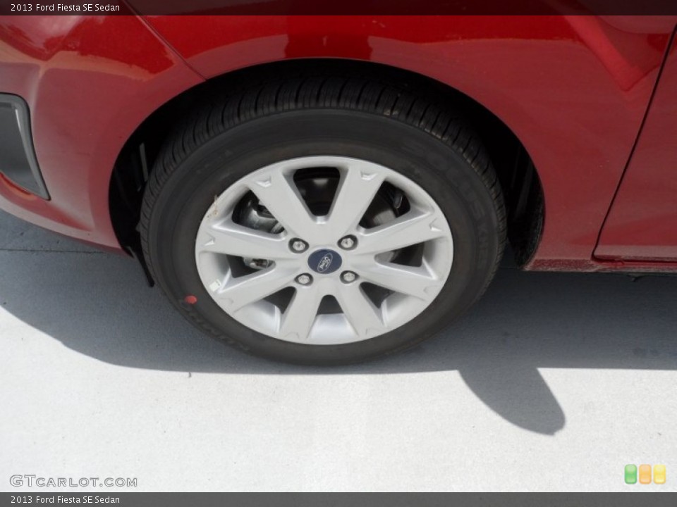 2013 Ford Fiesta SE Sedan Wheel and Tire Photo #68570815
