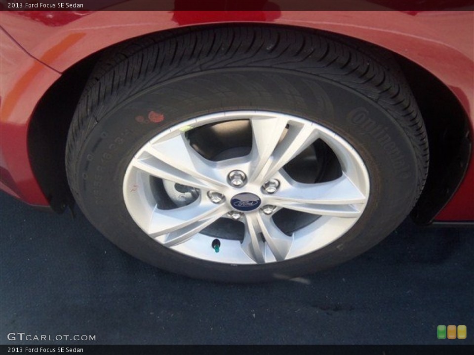 2013 Ford Focus SE Sedan Wheel and Tire Photo #69478234