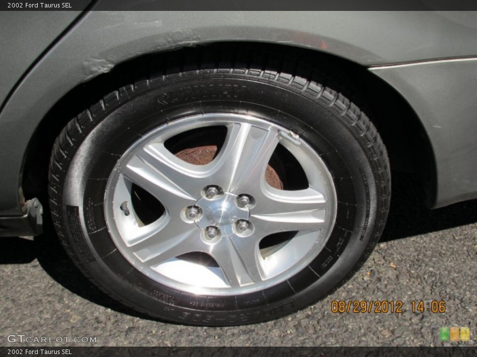 2002 Ford Taurus SEL Wheel and Tire Photo #70115094