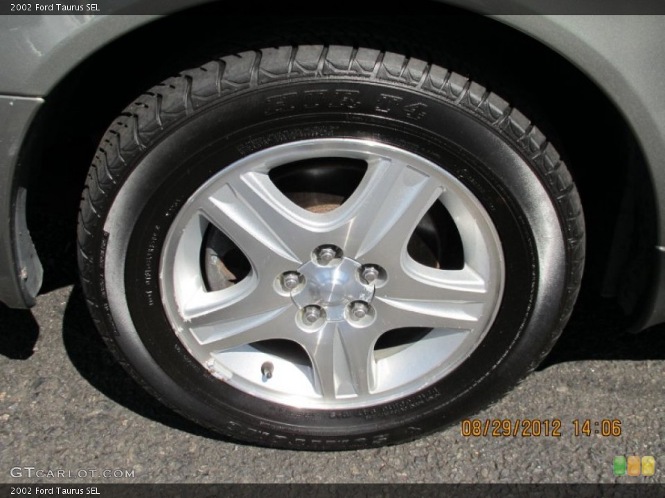 2002 Ford Taurus SEL Wheel and Tire Photo #70115104