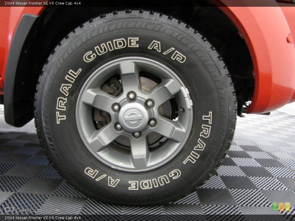 2004 Nissan Frontier XE V6 Crew Cab 4x4 Wheel and Tire Photo #71153646