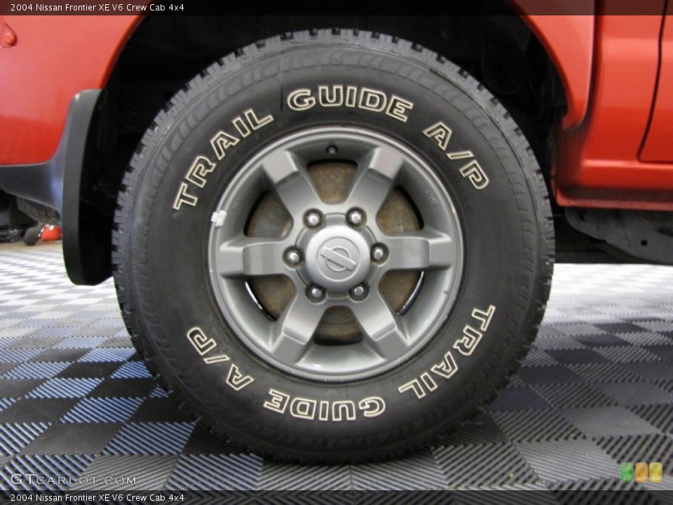 2004 Nissan Frontier XE V6 Crew Cab 4x4 Wheel and Tire Photo #71153658