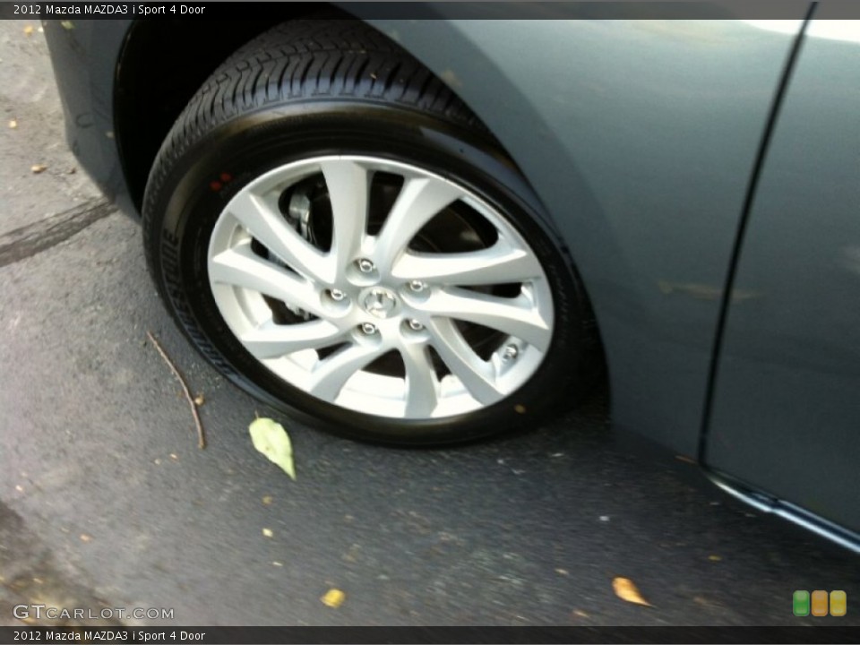2012 Mazda MAZDA3 i Sport 4 Door Wheel and Tire Photo #71417926