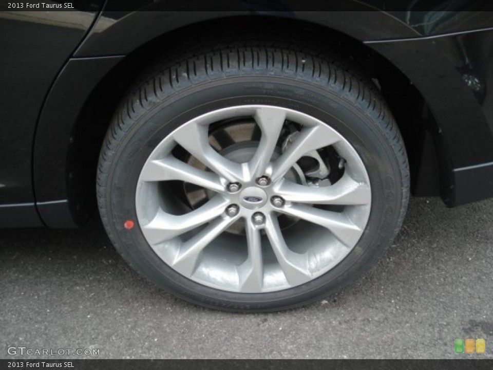 2013 Ford Taurus SEL Wheel and Tire Photo #71734784