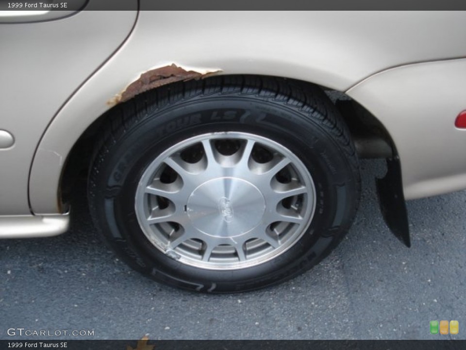 1999 Ford Taurus SE Wheel and Tire Photo #72244325