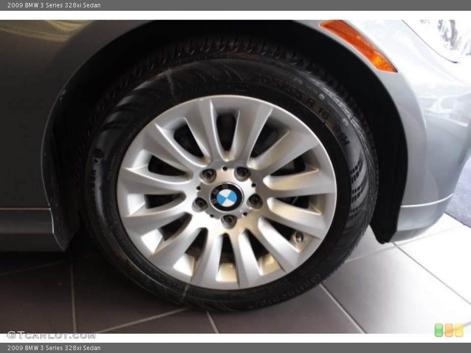 2009 BMW 3 Series 328xi Sedan Wheel and Tire Photo #72731149