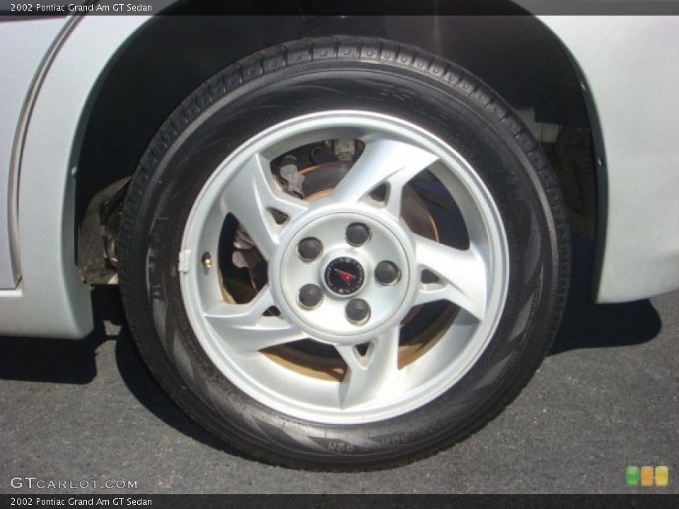2002 Pontiac Grand Am GT Sedan Wheel and Tire Photo #73198570