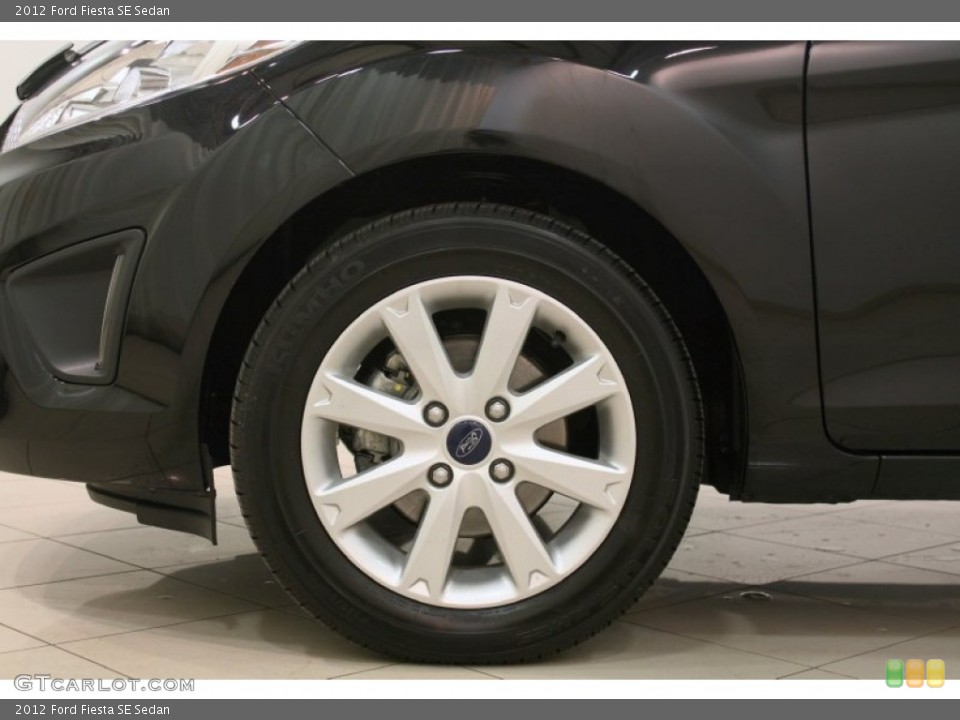 2012 Ford Fiesta SE Sedan Wheel and Tire Photo #75763406