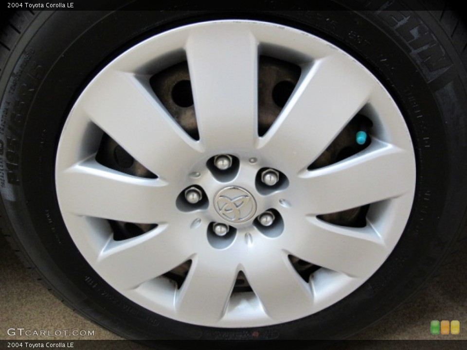 2004 Toyota Corolla LE Wheel and Tire Photo #76629401