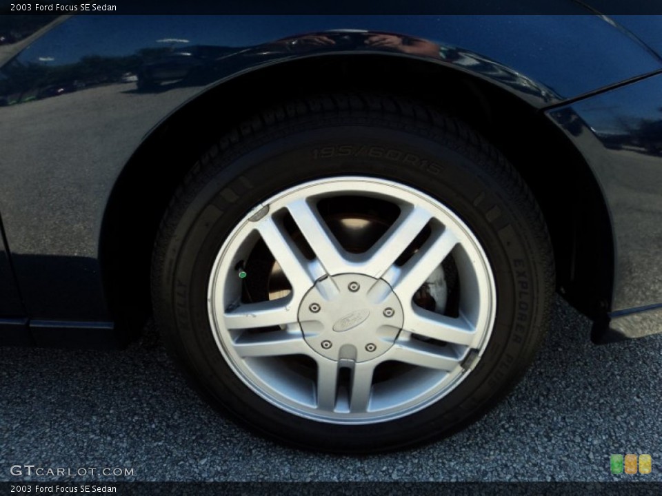 2003 Ford Focus SE Sedan Wheel and Tire Photo #79379221