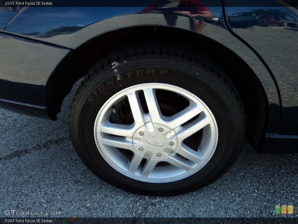 2003 Ford Focus SE Sedan Wheel and Tire Photo #79379239