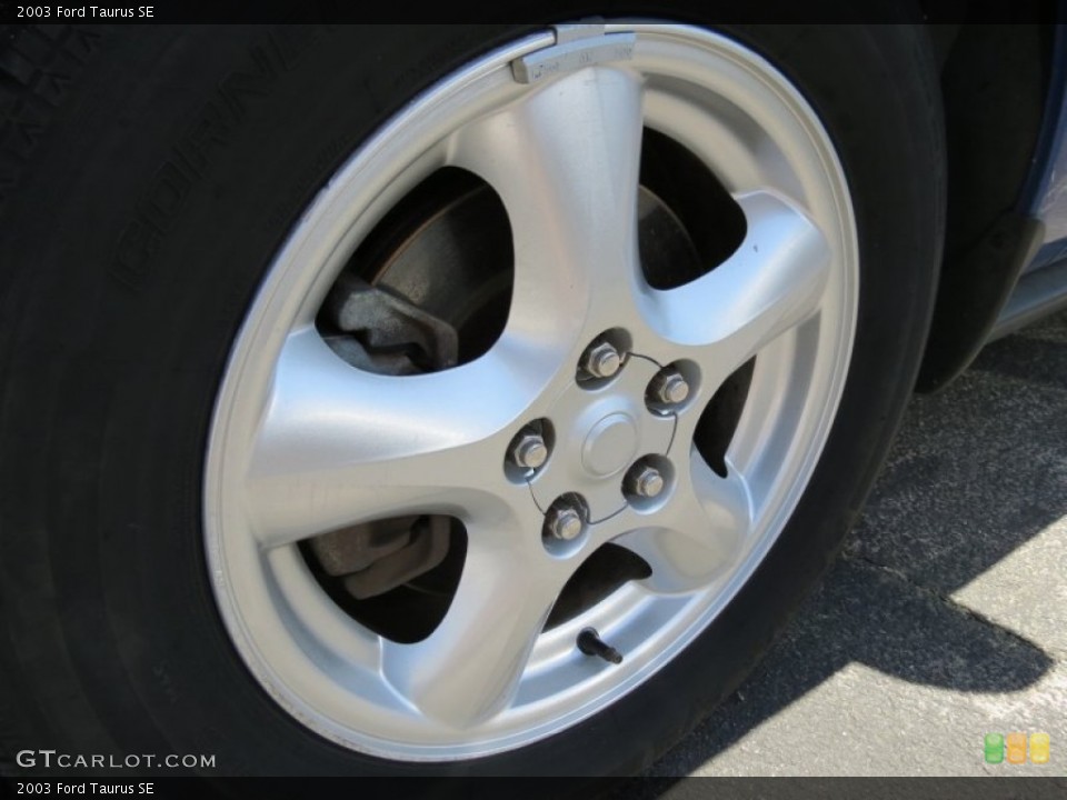 2003 Ford Taurus SE Wheel and Tire Photo #80259221