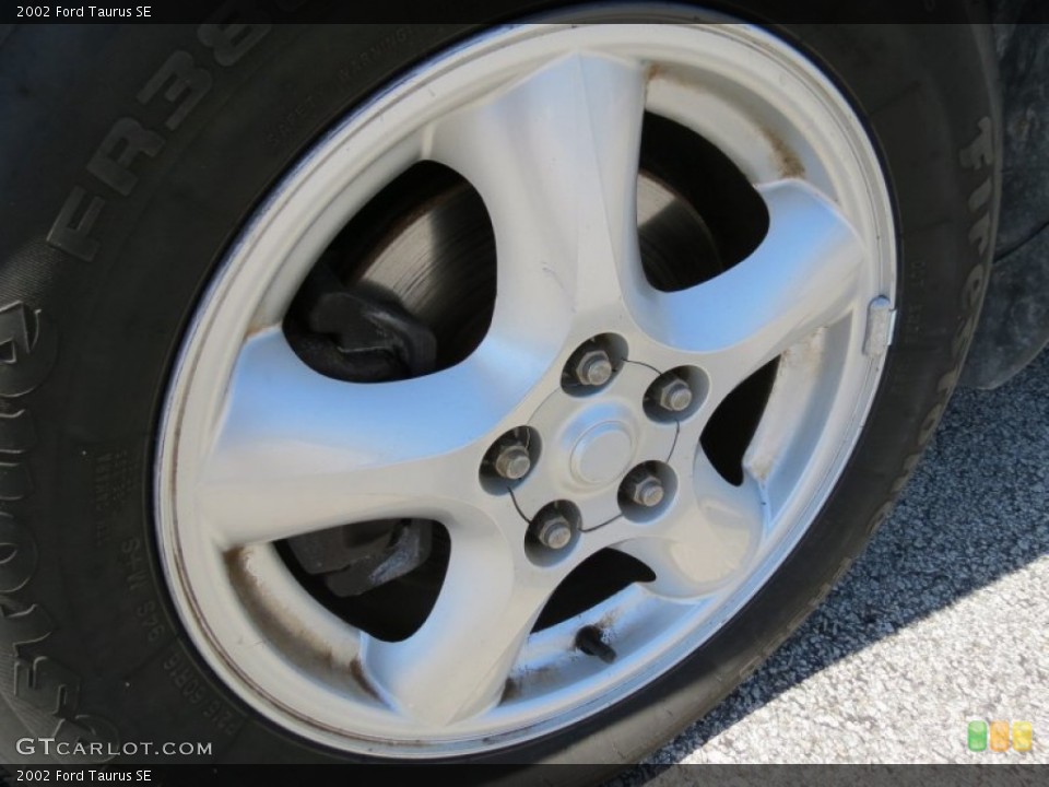 2002 Ford Taurus SE Wheel and Tire Photo #80260145