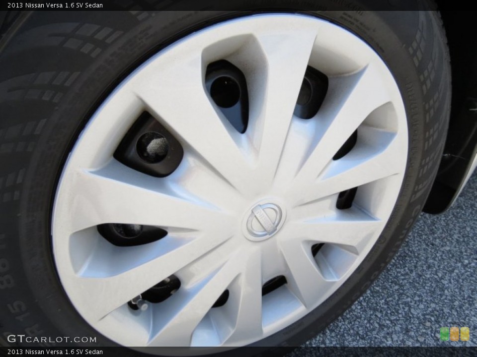 2013 Nissan Versa 1.6 SV Sedan Wheel and Tire Photo #80340000