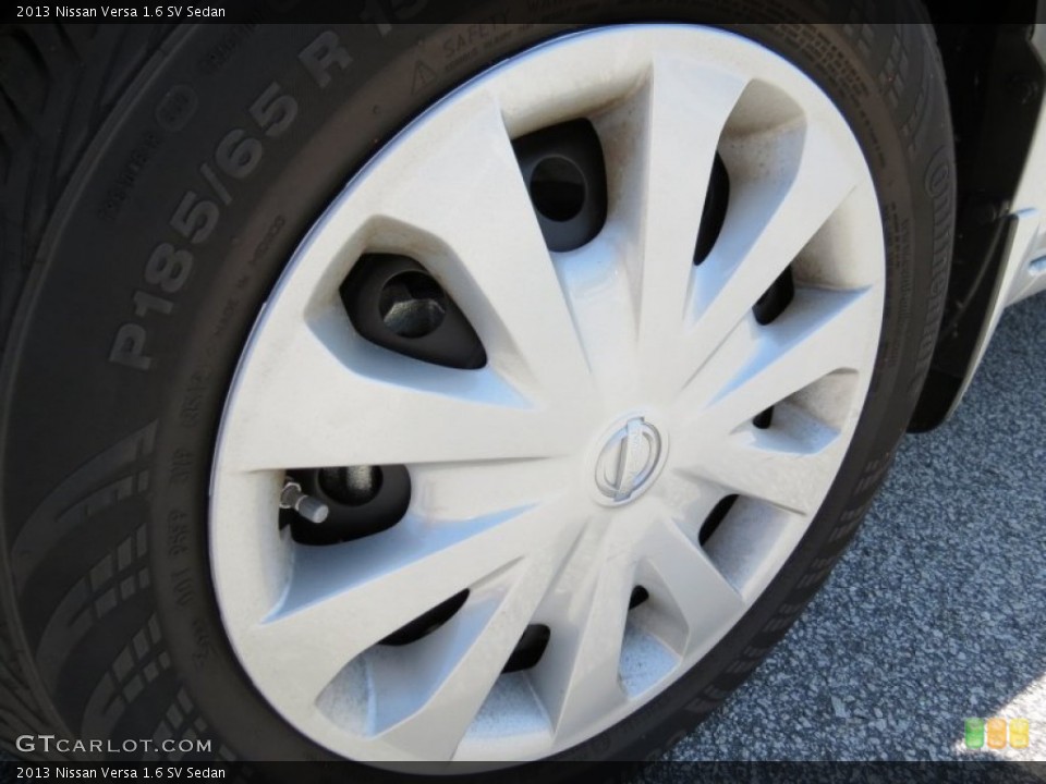 2013 Nissan Versa 1.6 SV Sedan Wheel and Tire Photo #80340301
