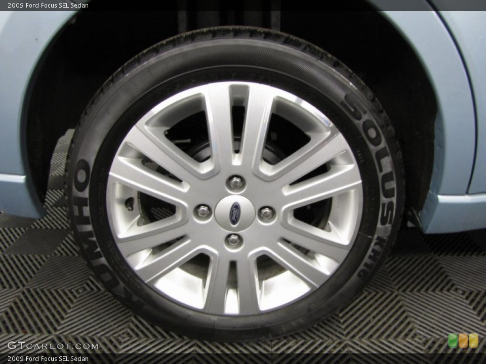 2009 Ford Focus SEL Sedan Wheel and Tire Photo #82126815