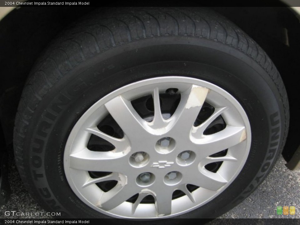 2004 Chevrolet Impala  Wheel and Tire Photo #82393548