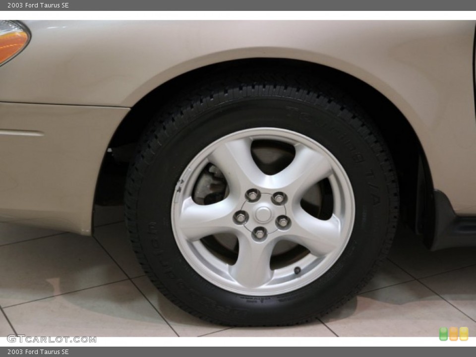 2003 Ford Taurus SE Wheel and Tire Photo #82730131