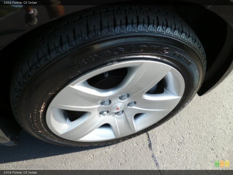 2009 Pontiac G6 Sedan Wheel and Tire Photo #82949582