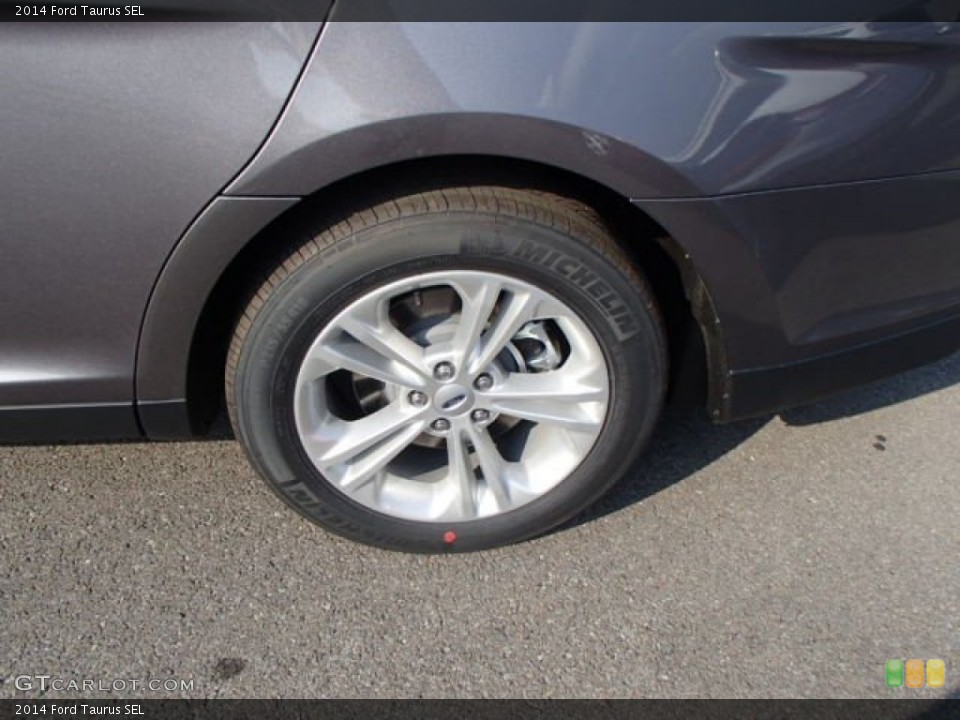 2014 Ford Taurus SEL Wheel and Tire Photo #83574102
