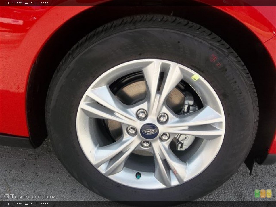 2014 Ford Focus SE Sedan Wheel and Tire Photo #84050978