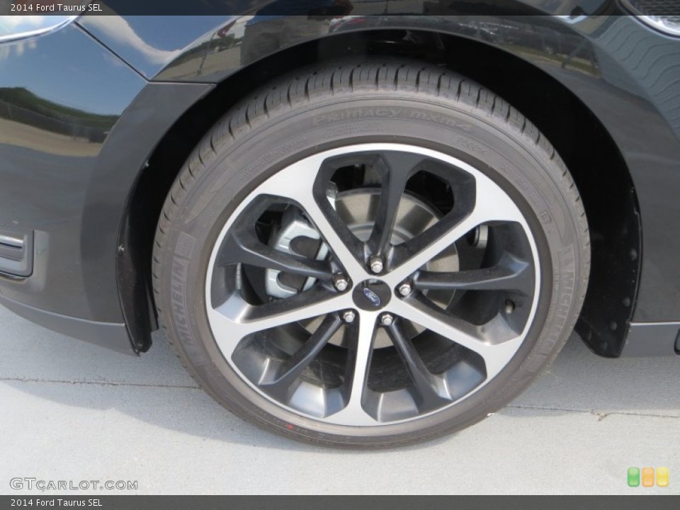 2014 Ford Taurus SEL Wheel and Tire Photo #84436704