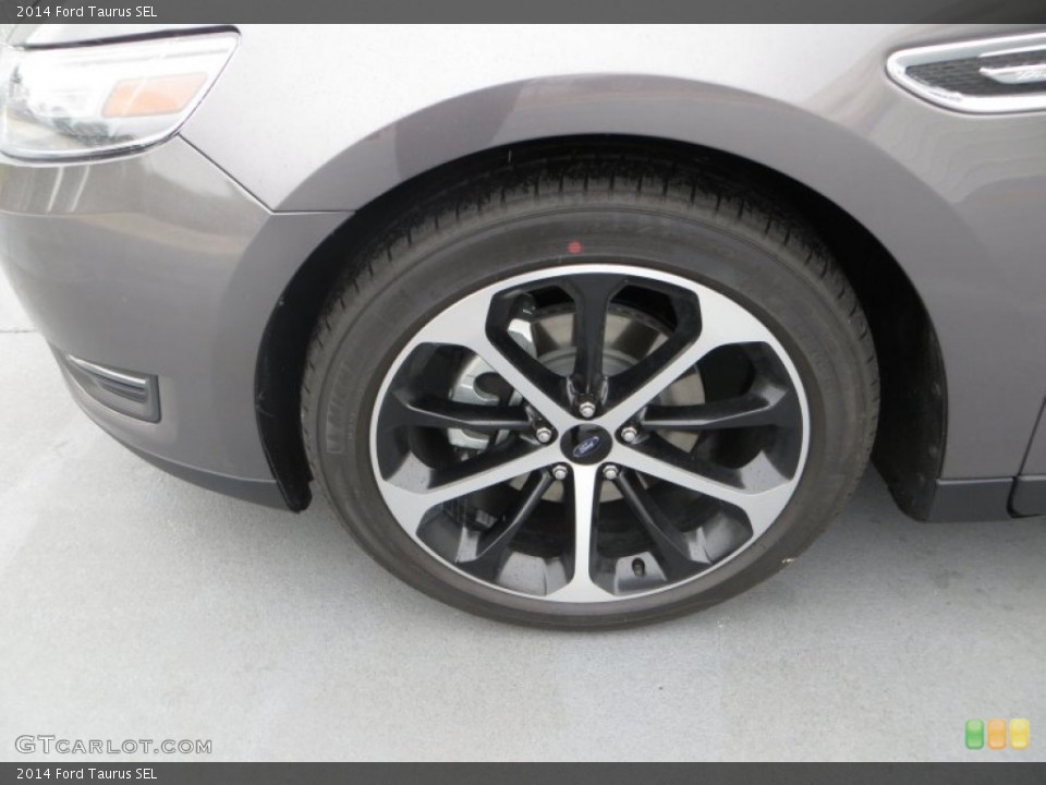2014 Ford Taurus SEL Wheel and Tire Photo #84655778
