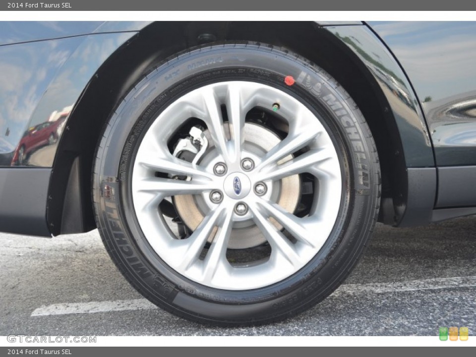 2014 Ford Taurus SEL Wheel and Tire Photo #85126502