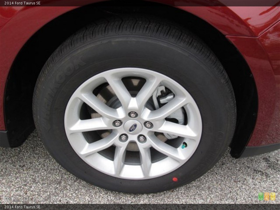 2014 Ford Taurus SE Wheel and Tire Photo #88871083
