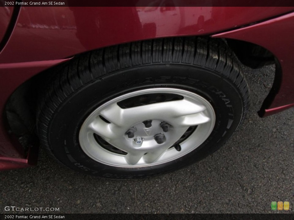 2002 Pontiac Grand Am SE Sedan Wheel and Tire Photo #89872417