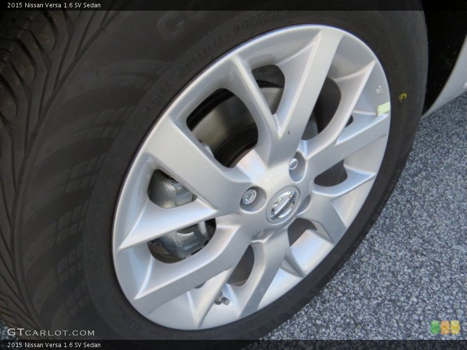 2015 Nissan Versa 1.6 SV Sedan Wheel and Tire Photo #93757250