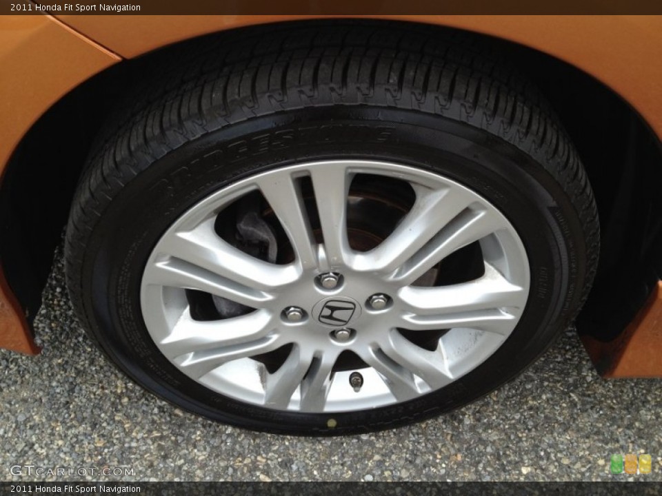2011 Honda Fit Sport Navigation Wheel and Tire Photo #93987381