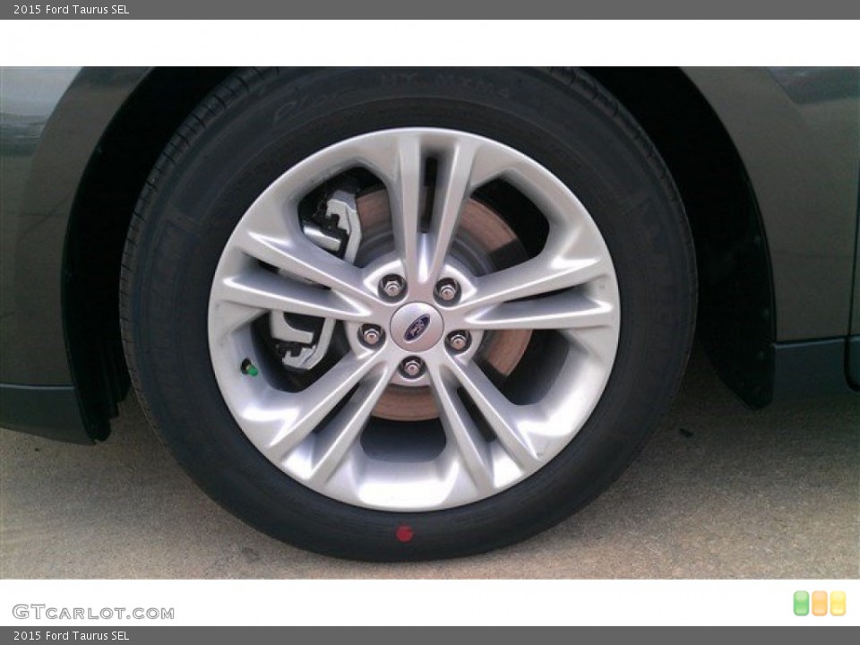 2015 Ford Taurus SEL Wheel and Tire Photo #97480536