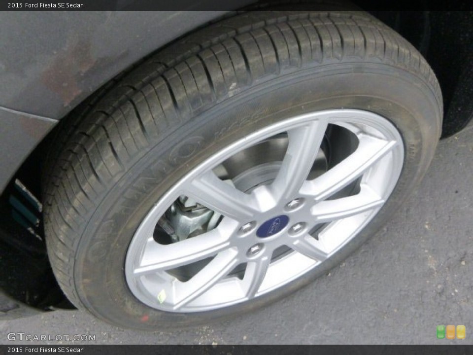 2015 Ford Fiesta SE Sedan Wheel and Tire Photo #97811362