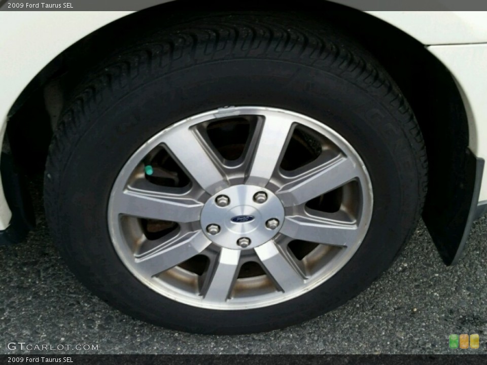 2009 Ford Taurus SEL Wheel and Tire Photo #99026625