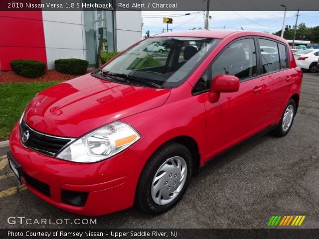 2010 Nissan Versa 1.8 S Hatchback in Red Alert