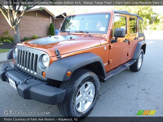 2010 Jeep Wrangler Unlimited Mountain Edition 4x4 in Mango Tango Pearl