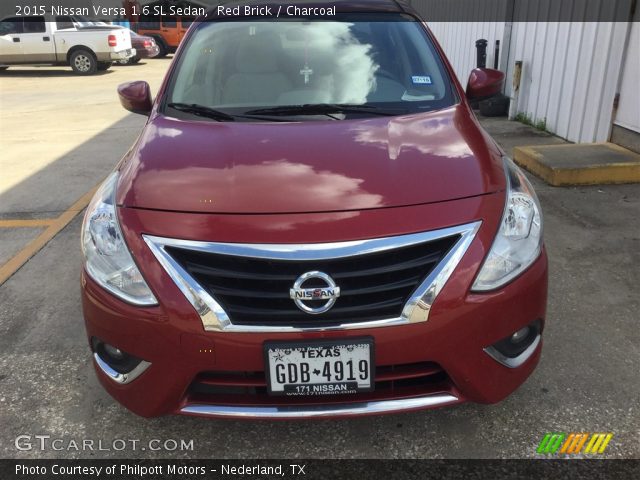 2015 Nissan Versa 1.6 SL Sedan in Red Brick