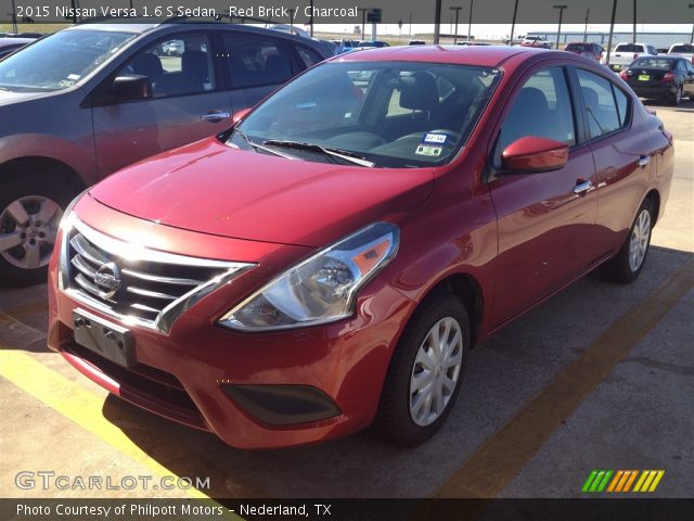 2015 Nissan Versa 1.6 S Sedan in Red Brick