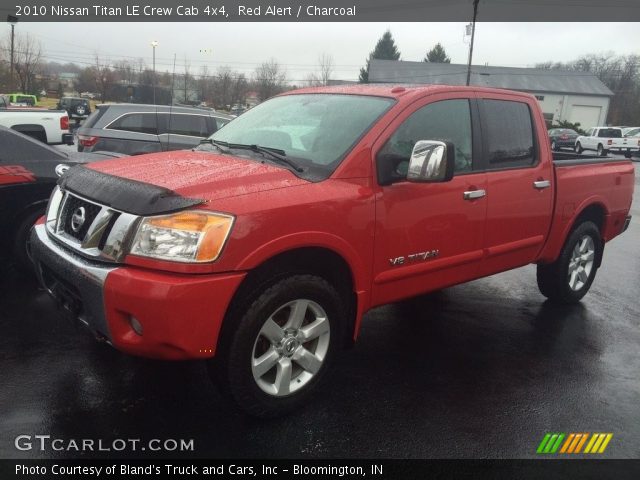 2010 Nissan Titan LE Crew Cab 4x4 in Red Alert