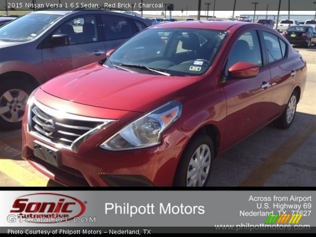 2015 Nissan Versa 1.6 S Sedan in Red Brick
