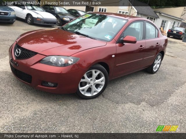 2008 Mazda MAZDA3 i Touring Sedan in True Red