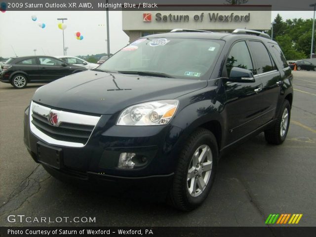 2009 Saturn Outlook XR AWD in Midnight Blue