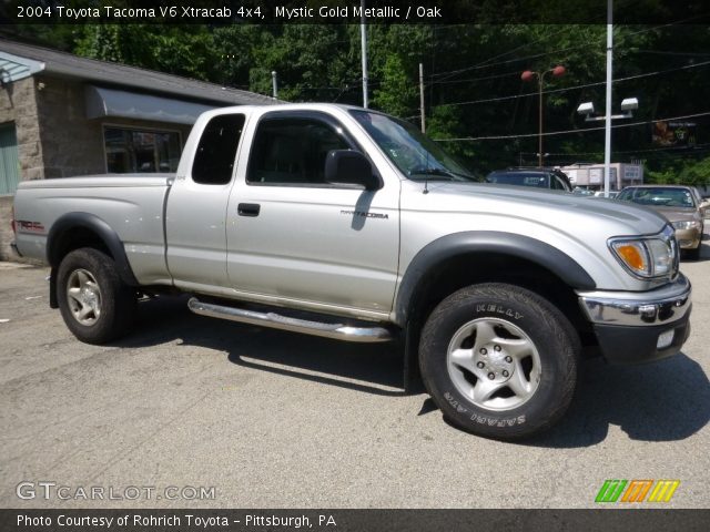 2004 Toyota Tacoma V6 Xtracab 4x4 in Mystic Gold Metallic