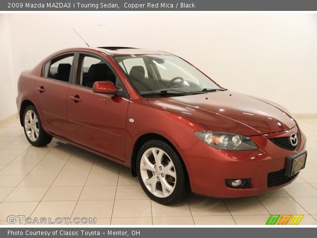 2009 Mazda MAZDA3 i Touring Sedan in Copper Red Mica